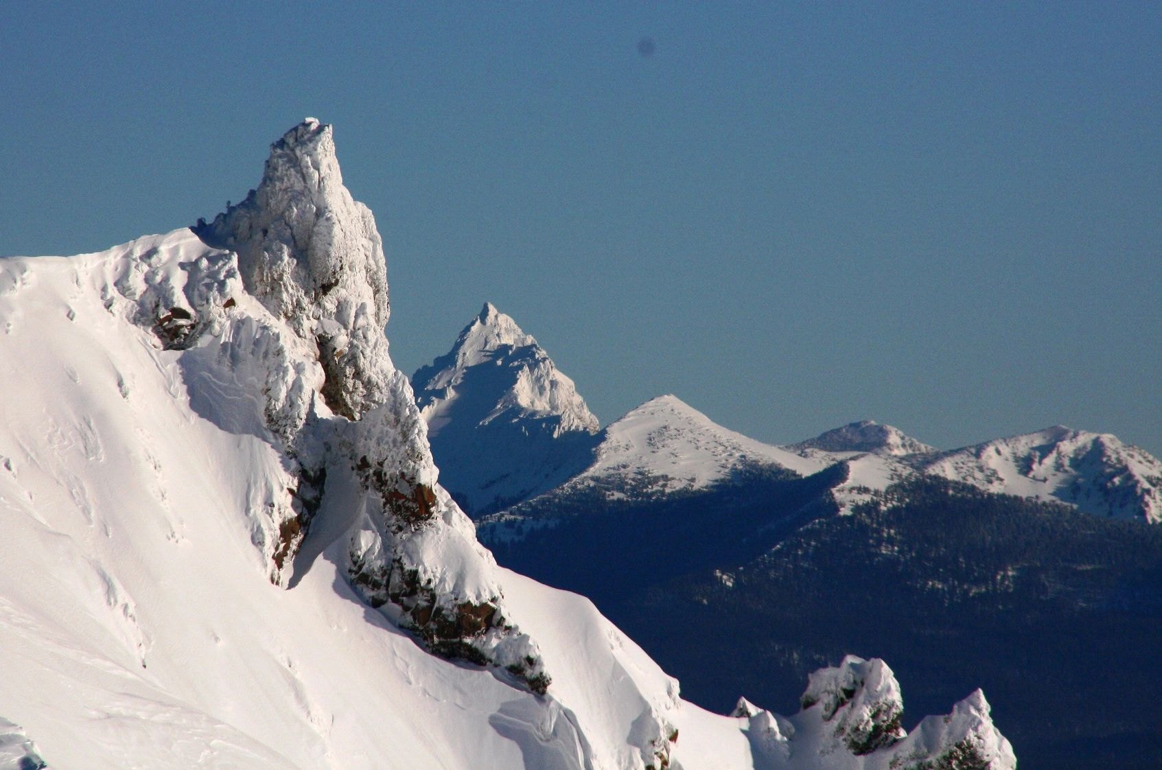 Alpine snow-covered rocky peaks landscape